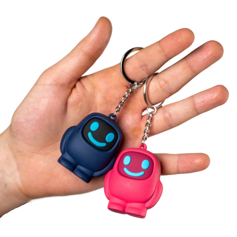 Dos dispositivos Scrolly, azul marino y rosa, en una mano abierta